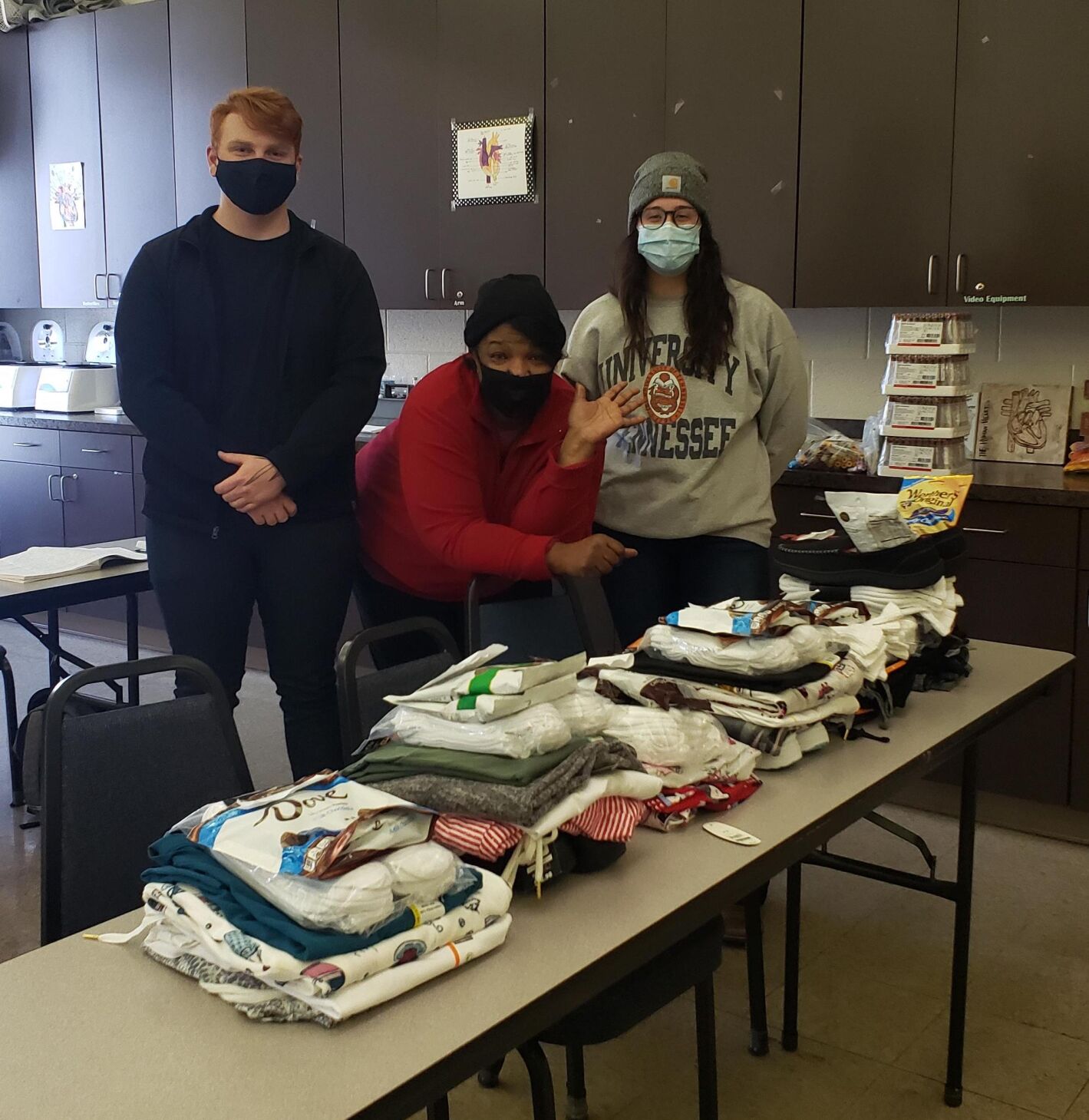 Phlebotomy students collected and packaged gifts for senior angels